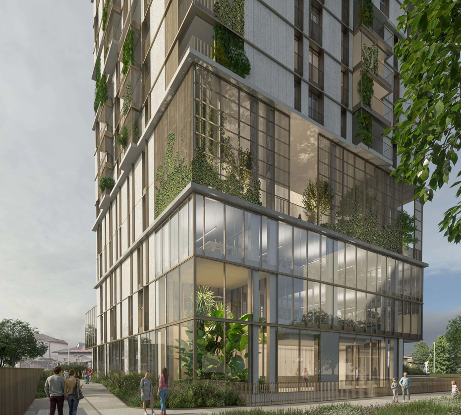 Primo piano piano terra torre residenziale verde con facciata vetro ampia e passanti